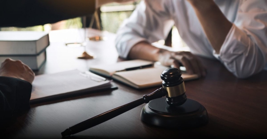 stressed client consulting a lawyer
