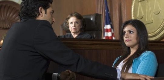 attorney questioning a teenage girl on the witness stand